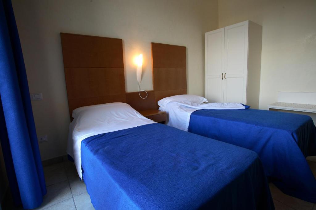 Hotel Resort Portoselvaggio Сант'Ізідоро Номер фото